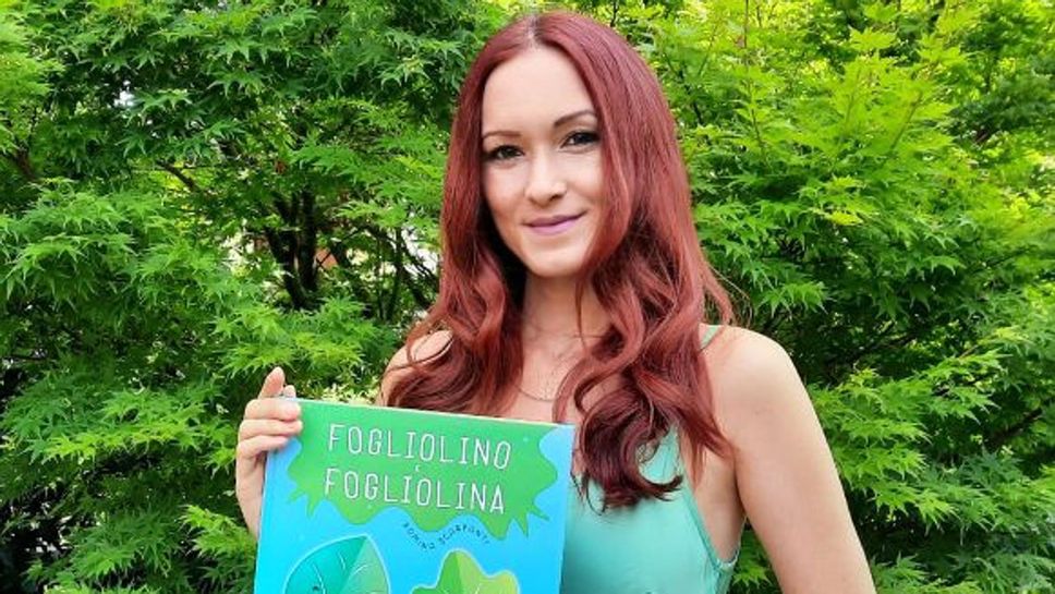 Romina Scarpanti con la copertina del libro “Fogliolino e Fogliolina” Romina Scarpanti con la copertina del libro “Fogliolino e Fogliolina”